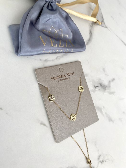 Vezzi naszyjnik choker zloty stal nierdzewna kwiatki koniczyna