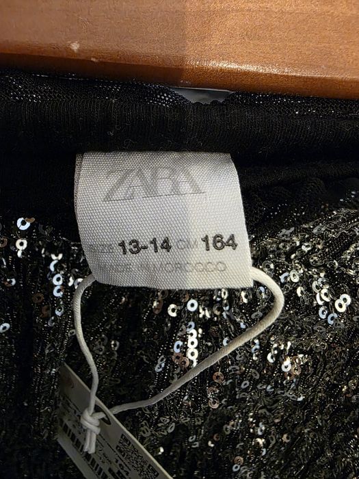 Mini saia lantejoulas, nova