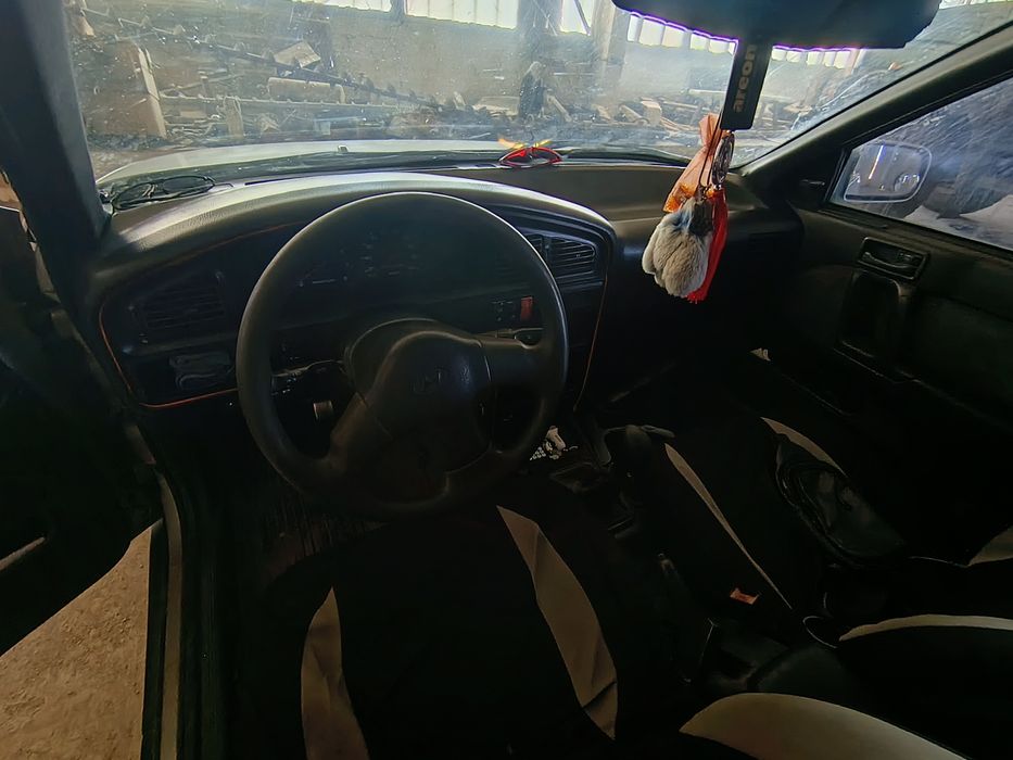 HYUNDAI LANTRA 1993 VIN KMHJF31JPPU448392 фото оголошення 4 з 12