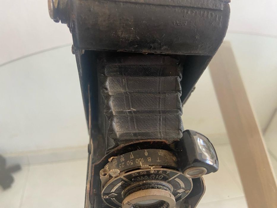 Máquina fotográfica antiga429044519068641282