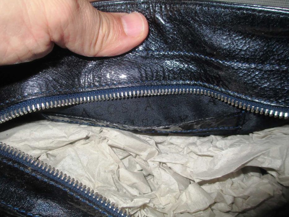 Mala Acosta de verniz