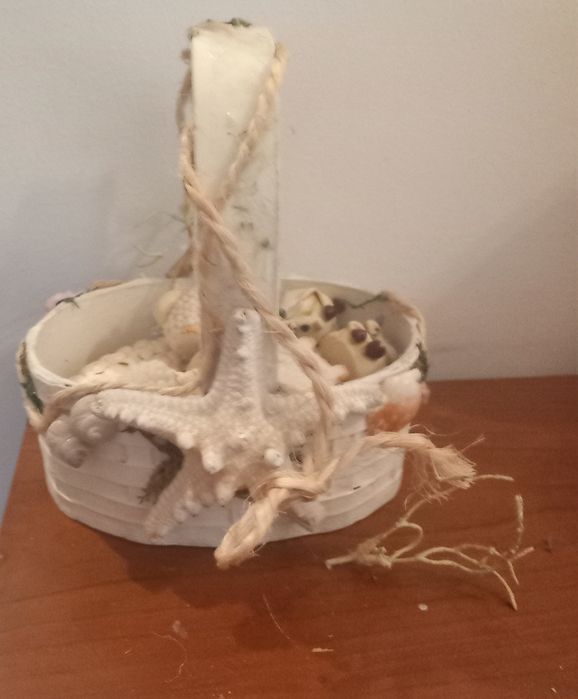 Cesta com conchas