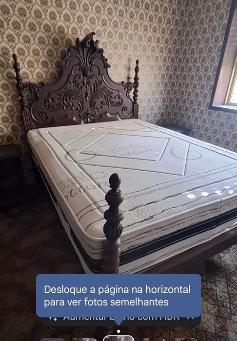 Cama antiga com estrado