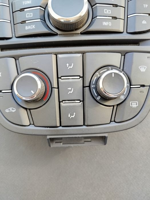 Панель кнопок Opel Astra J (магнітола обдув).
