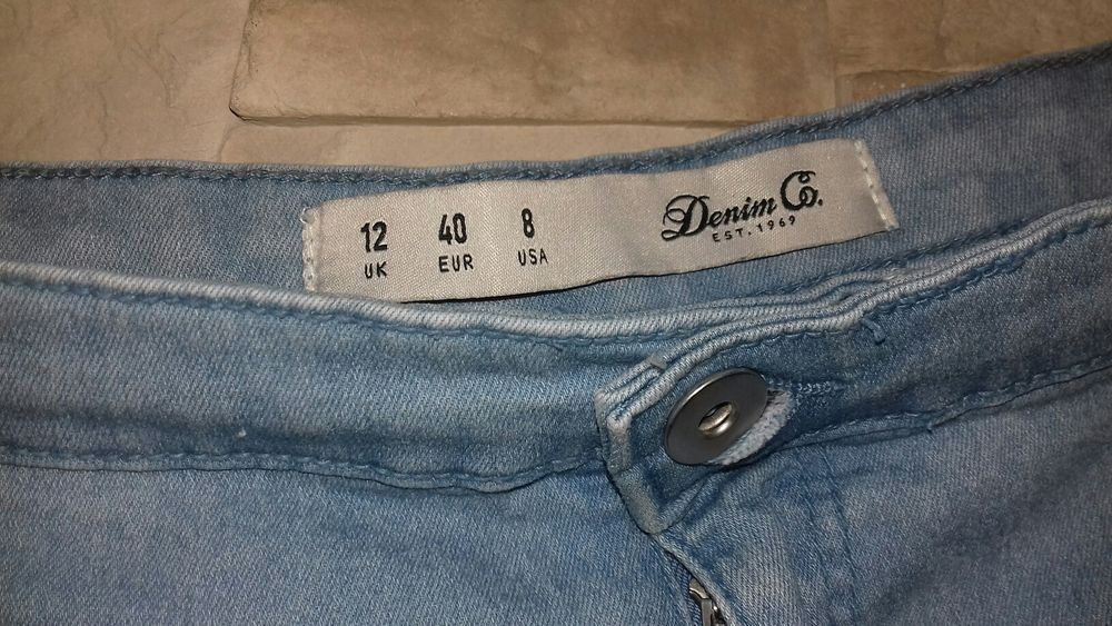 H&M spodnie rurki z dziurami 40