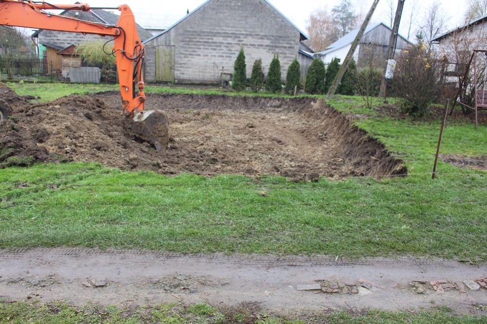 Czyszczenie działki pod budowę wyrywanie karp wywóz równanie