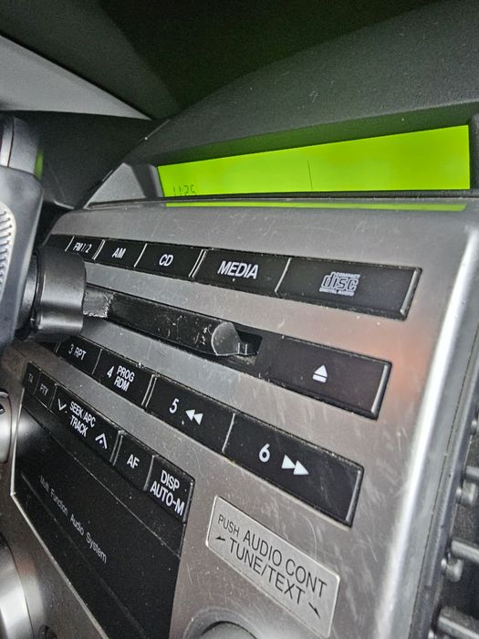 Тримач телефону в CD привід, перехідник