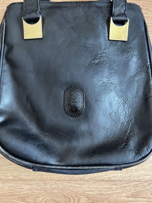 Mala de pele preta mulher