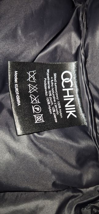 Puchowy płaszcz z pięknym obszyciem z Ochnik 36