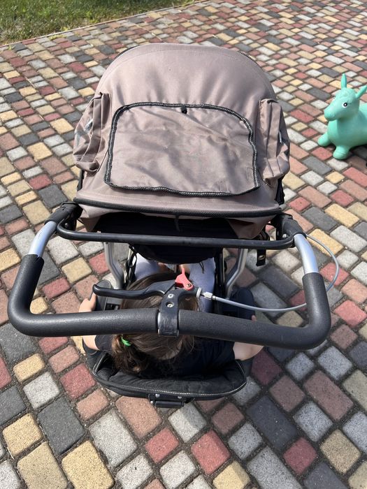 Прогулочная коляска с люлькой TFK Joggster Twist
