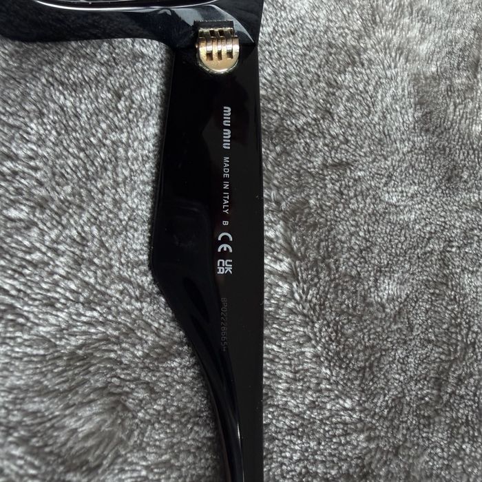 Okulary przeciwsłoneczne Miu Miu SMU 08W czarne