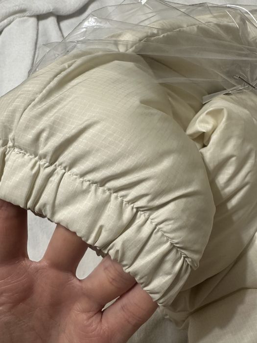 Пуховик жіночий Colambia М (молочний)