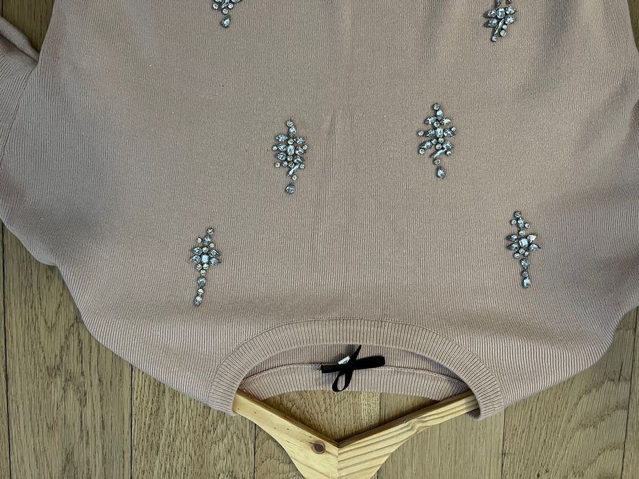 camisola de cor rosa. manga balão
