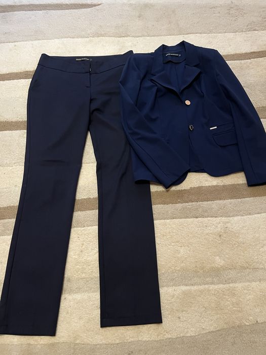 Костюми жіночі класичний і прогулочний