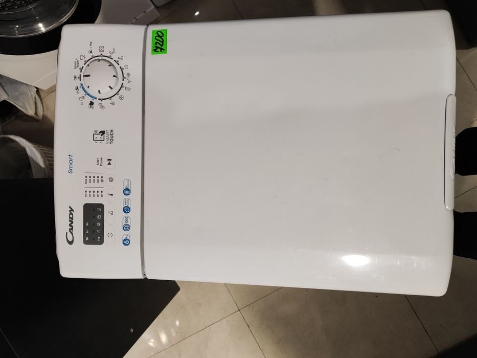 Вертикальна пральна машина Candy CST360L-S з Європи