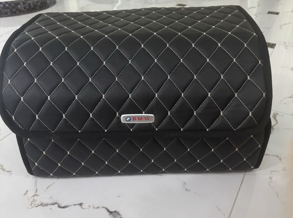 Аксесуары в багажник автомобиля