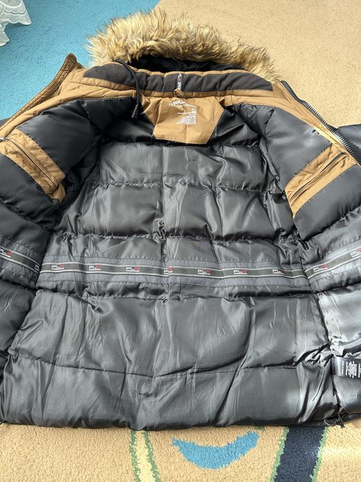 Зимовий довгий пуховик