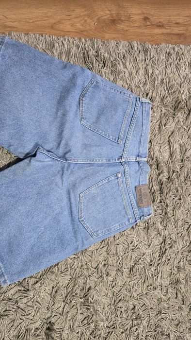 Krotkie spodnie spodenki jeansy Wrangler Jak nowe