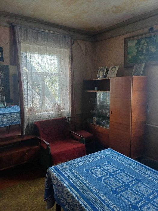 Продам 1/2 будинка в м.Богодухові