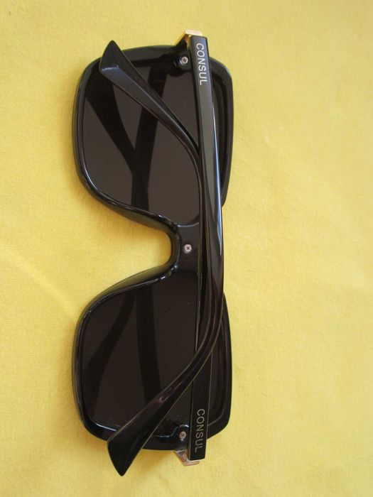 Очки солнцезащитные Consul Polaroid.