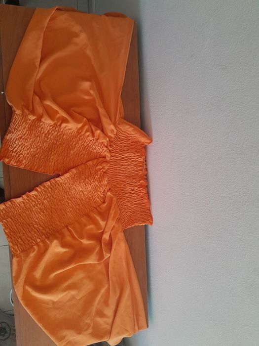 Blusa laranja bom estado