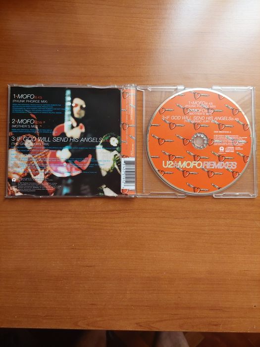 U2 CD - Mold Remixed Tracks.431280015698176001