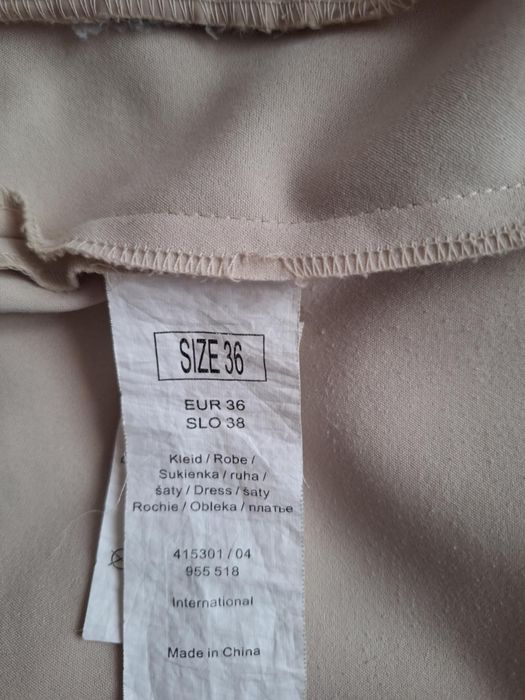 Beżowa sukienka marki Orsay. Rozmiar 36
