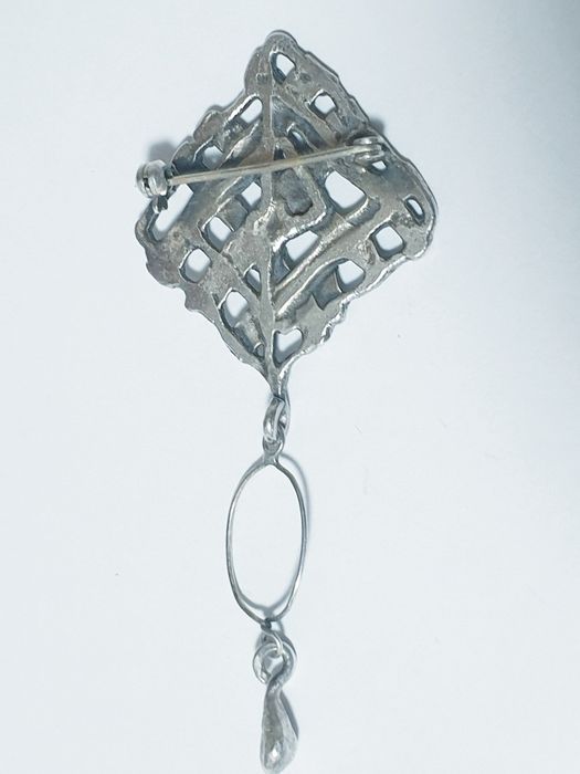 Pregadeira  vintage em prata contrastada