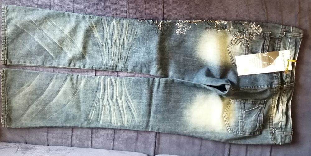 Nowe spodnie jeansy 40
