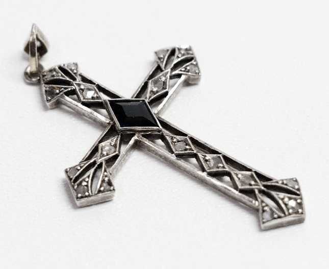 Vendo cruz com 18 diamantes