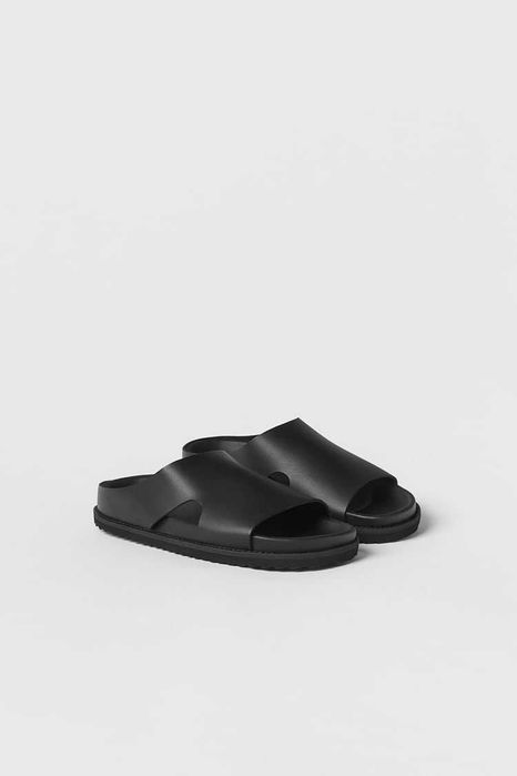 Стильні шкіряні шльопанці від Zara