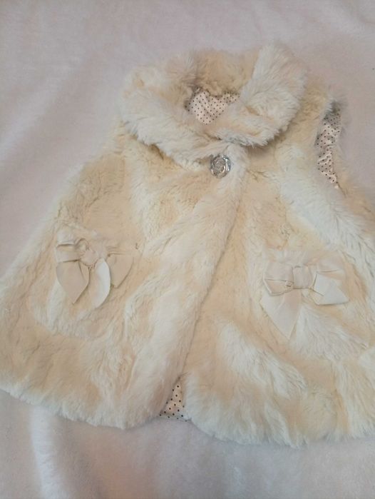 Безрукавки для дівчинки