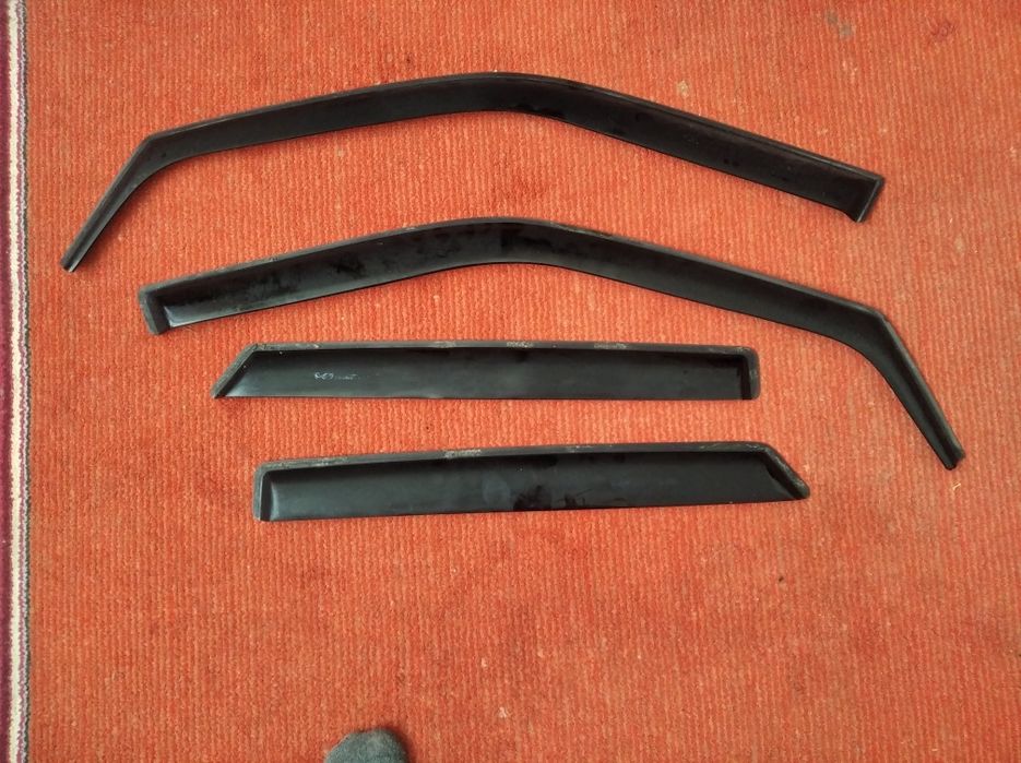 Дефлектор(бленда,спойлер)заднього вікна ваз пріора