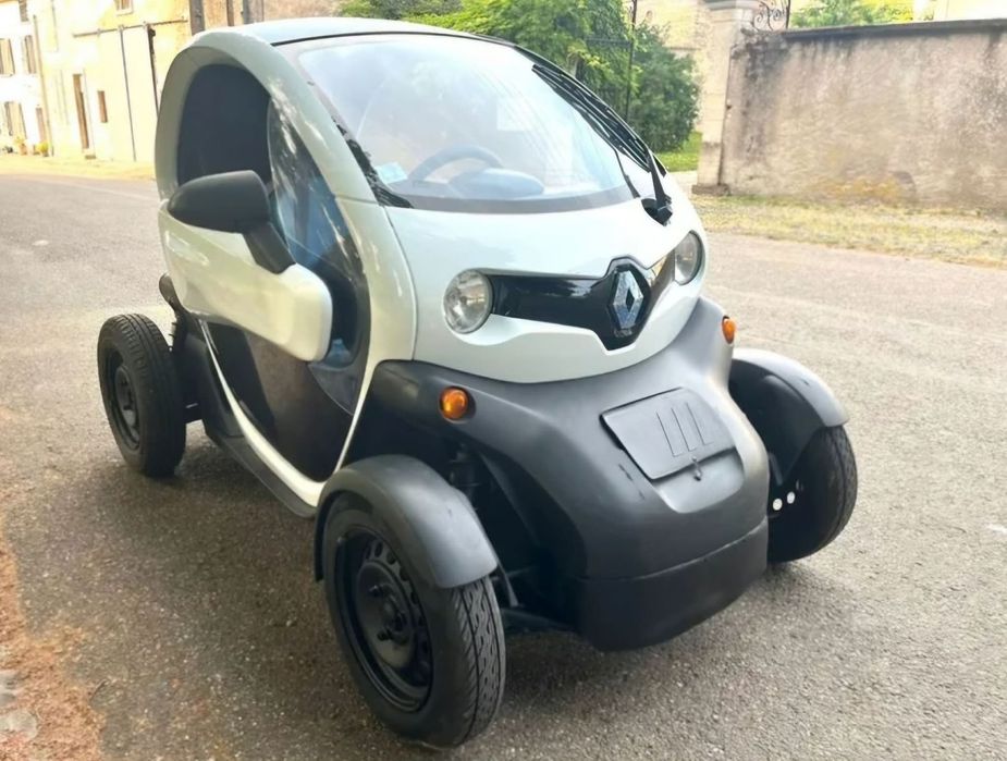 RENAULT TWIZY PLASTIK OBUDOWA KOLUMNA KOŁA ZACISK ZWROTNICA