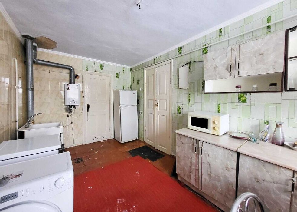 Продаж частини будинку в Центрі