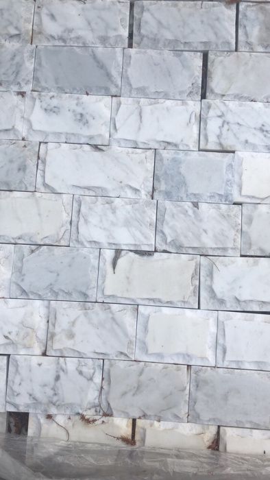 Мраморная плитка для облицовки камина