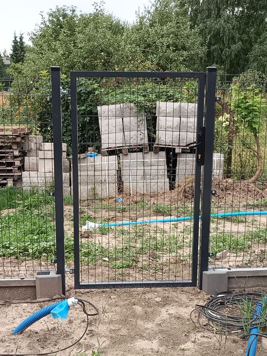 Ogrodzenia panelowe brama furtka montaż słupek panel podmurówka wola