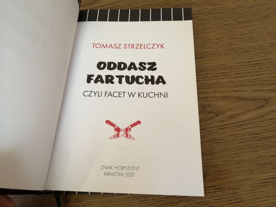 Oddasz fartucha Tomasz Strzelczyk