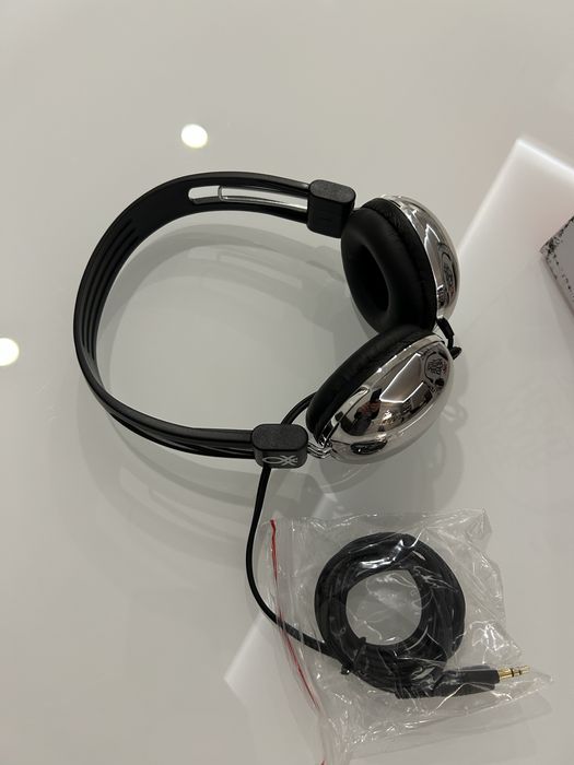 Auscultadores Benetton