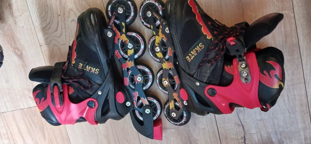 Дитячі яскраві майже нові ролики рр 35 38,