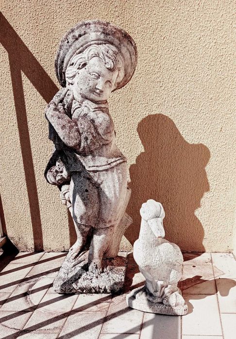 Pato de Pedra Menino de Pedra