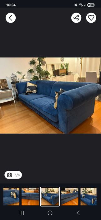 Sofa azul com pouco uso.