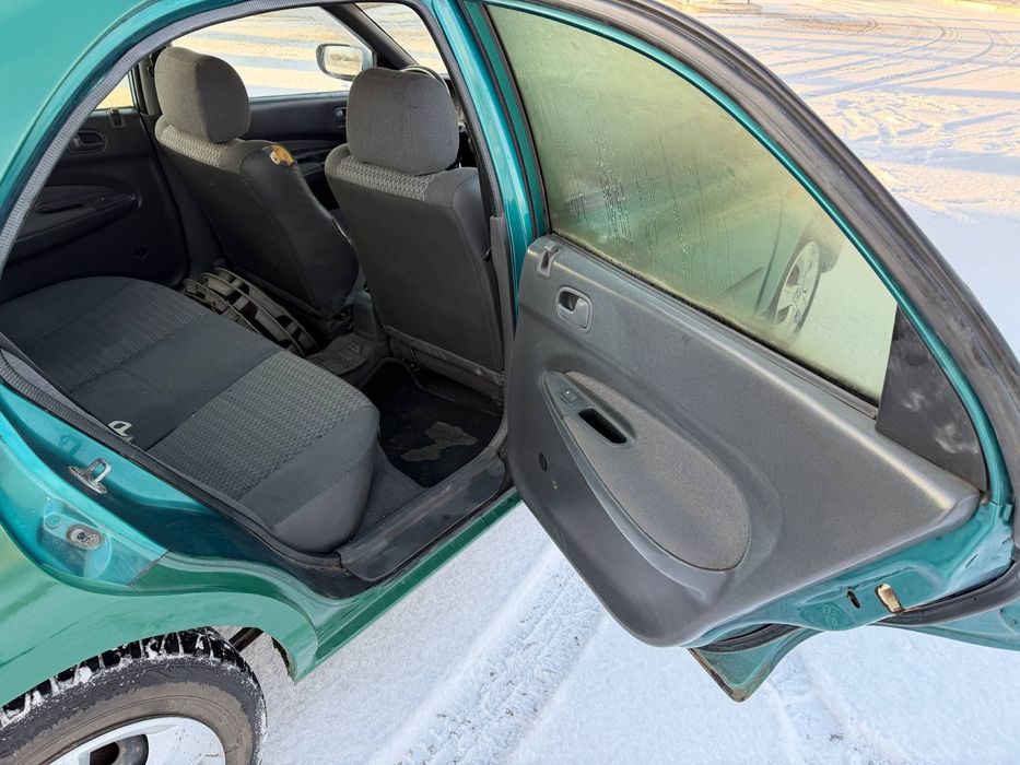 Продам Mazda 323