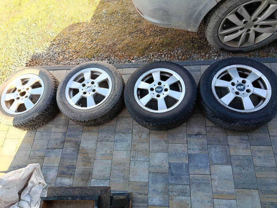 Alufelgi 14 peugeot 206 z oponami zimowymi.