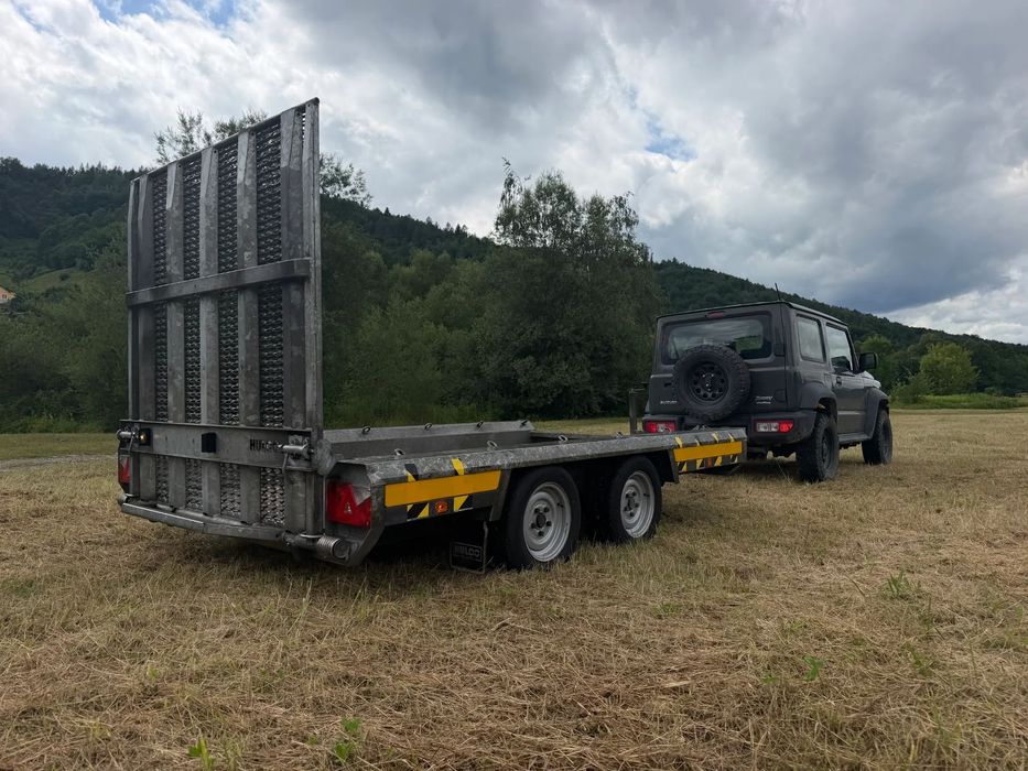 Przyczepa Dwuosiowa Ciężarowa-LAWETA Do Koparek Maszyn Budowlanych. HULCO TERRAX-2 3001-LK.  NAJAZD Pełny Klapa z Bardzo mocnej konstrukcji. Lekki system otwierania najazdu jedną ręką! DMC 3000Kg! Jest To Laweta marki PREMIUM. Dwie ośie hamujące! Pełny oc