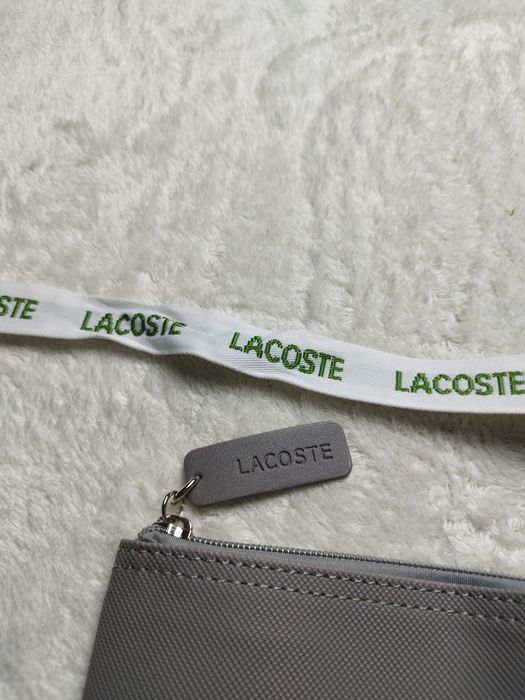 Mala Lacoste nova
