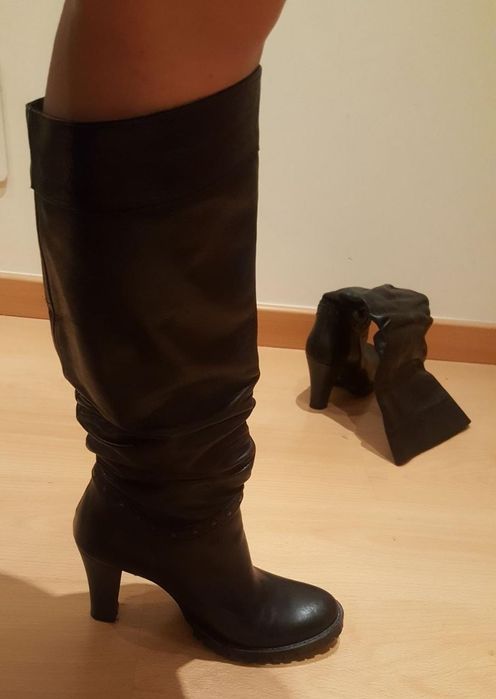 Botas em pele castanhas