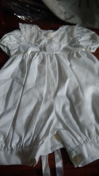 Vestidos e fatinhos de batizado