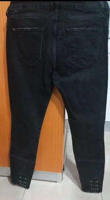 Calças de ganga rasgadas