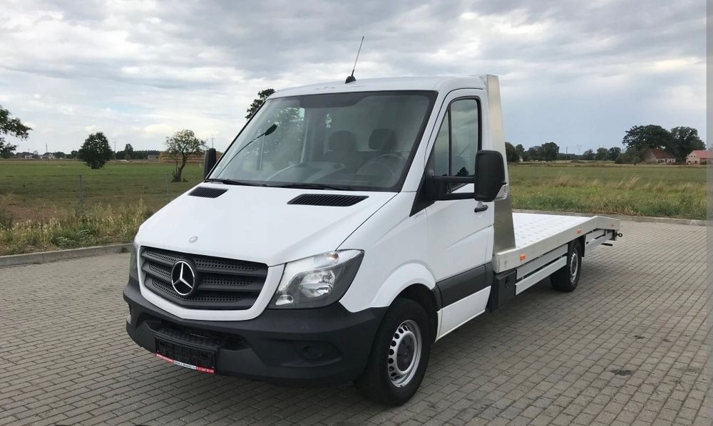 Pomoc Drogowa autolaweta Samochód zastępczy